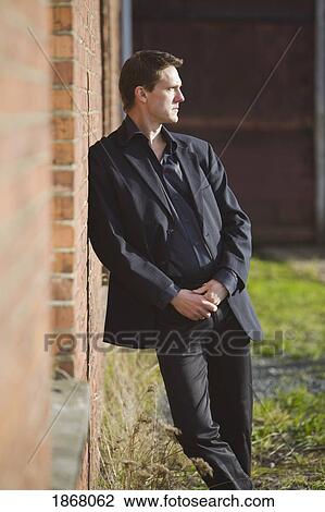 Stock Image - man wearing a suit. Fotosearch