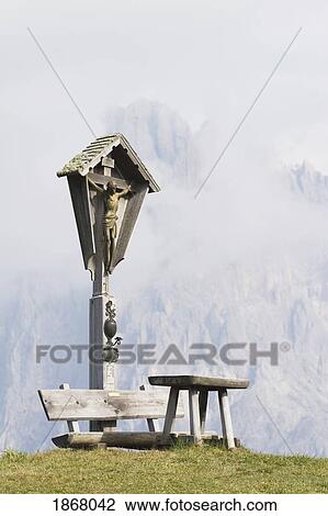 Stock Image - memorial crucifix on a mountain, siusi allo sciliar, alto adige, italy. Fotosearch