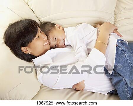 mother holding her son View Large Photo Image Stock Photography - mother holding her son. Fotosearch
