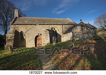 northumberland, england; a stone church with a cemetery in autumn View Large Photo Image Stock Photo - northumberland, england; a stone church with a cemetery in autumn. Fotosearch