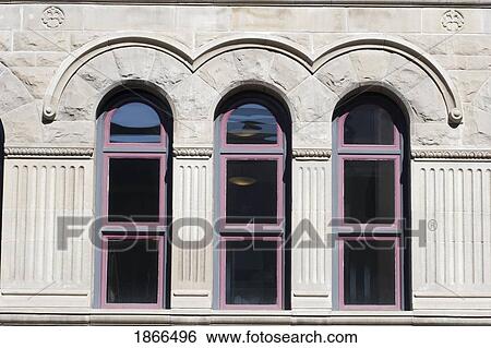 Old sandstone building and windows View Large Photo Image Stock Photograph - Old sandstone building and windows. Fotosearch