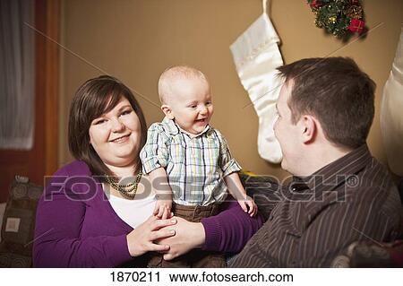 parents with a baby boy View Large Photo Image Stock Image - parents with a baby boy. Fotosearch