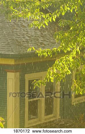 Stock Image - portland, oregon, united states of america; a house in the rain in september. Fotosearch