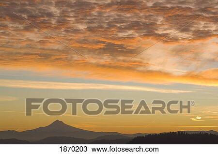 Stock Image - portland, oregon, united states of america; view of the sunrise over mount hood from mount tabor. Fotosearch