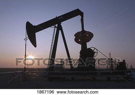 pumpjack and sunrise, central alberta, canada View Large Photo Image Stock Photograph - pumpjack and sunrise, central alberta, canada. Fotosearch