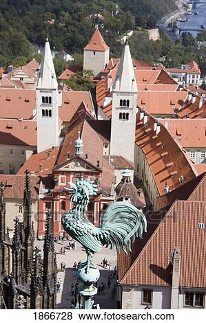 Stock Photo - rooster on a church steeple, prague, czech republic. Fotosearch
