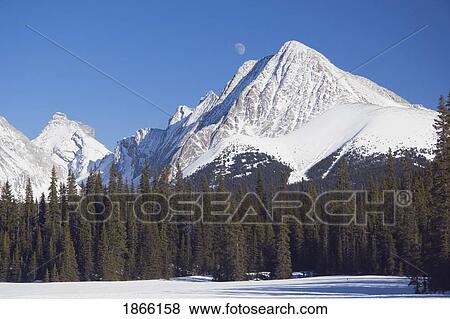 Stock Photo - Snow-covered mountains, Kananaskis Country, Alberta, Canada. Fotosearch