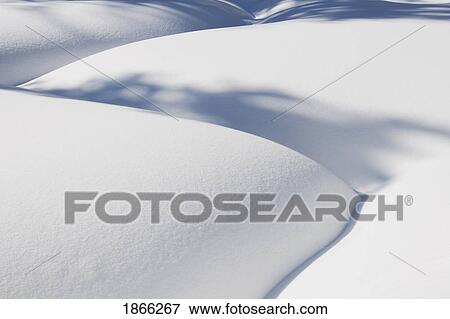 Stock Photo - Snow drifts, Kananaskis Country, Alberta, Canada. Fotosearch