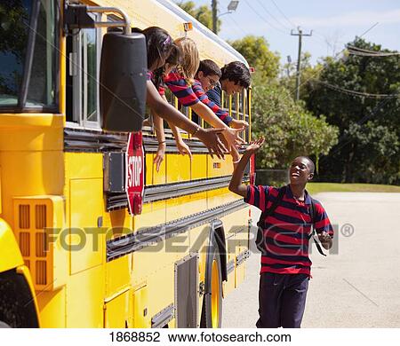 student greeting friends from school bus windows View Large Photo Image Stock Image - student greeting friends from school bus windows. Fotosearch