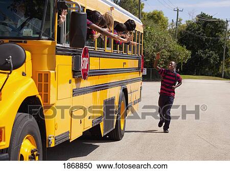 student running and waving goodbye to friends on the school bus View Large Photo Image Stock Image - student running and waving goodbye to friends on the school bus. Fotosearch