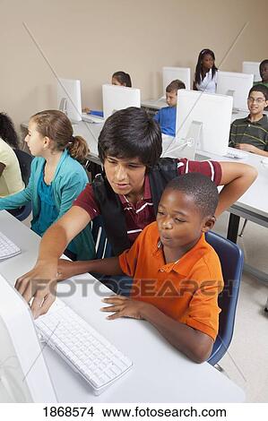 Picture - students in computer class. Fotosearch