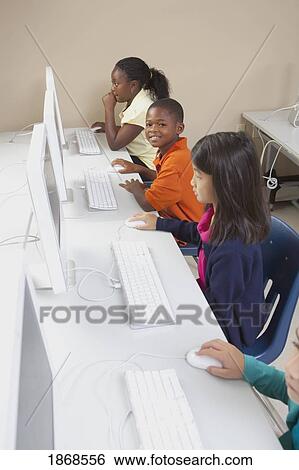 Stock Photograph - students in computer class. Fotosearch