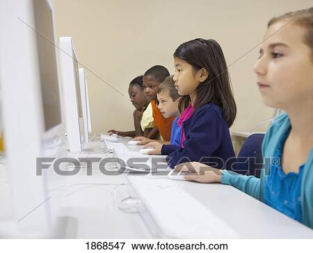 Stock Photo - students working on their computers. Fotosearch