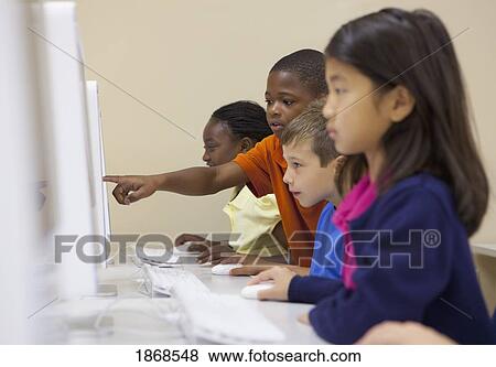Stock Photo - students working on their computers. Fotosearch