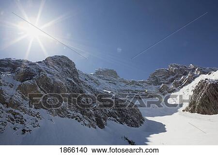 Sunlight over Cascade Mountain, Banff National Park, Alberta View Large Photo Image Stock Image - Sunlight over Cascade Mountain, Banff National Park, Alberta. Fotosearch