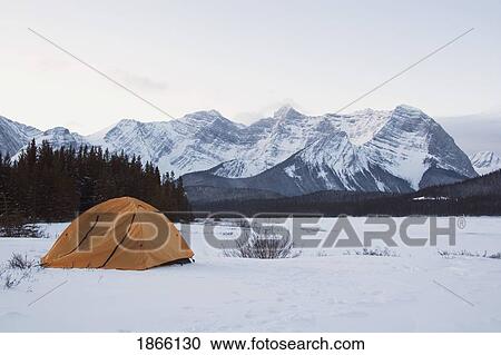 Tent in snow-covered meadow, Kananaskis Country, Alberta, Canada View Large Photo Image Stock Image - Tent in snow-covered meadow, Kananaskis Country, Alberta, Canada. Fotosearch