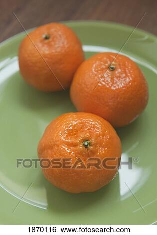 three oranges on a plate View Large Photo Image Stock Photograph - three oranges on a plate. Fotosearch