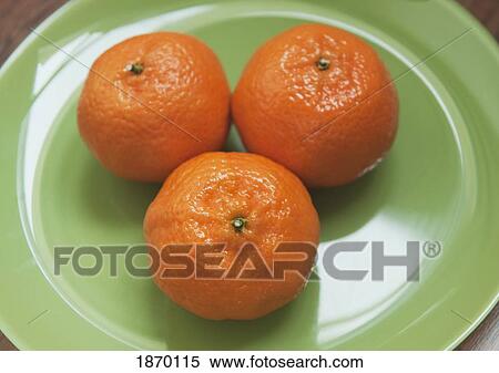 three oranges on a plate View Large Photo Image Stock Photography - three oranges on a plate. Fotosearch