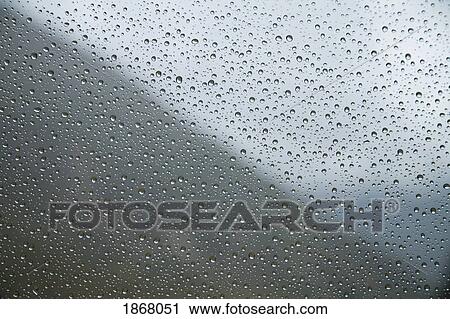 Stock Image - water drops on a window. Fotosearch