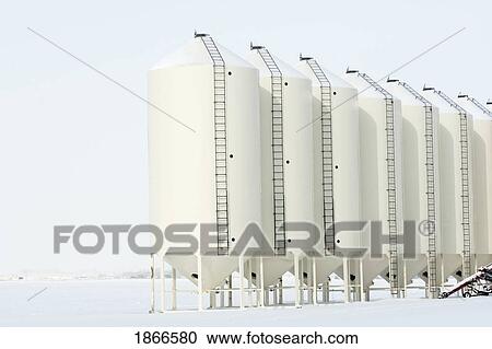 White metal grain bins in the winter View Large Photo Image Stock Image - White metal grain bins in the winter. Fotosearch