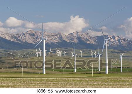 wind farm and mountains, southern alberta, canada View Large Photo Image Stock Photography - wind farm and mountains, southern alberta, canada. Fotosearch