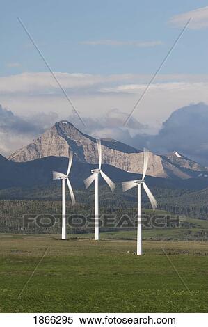 wind farm and mountains, southern alberta, canada View Large Photo Image Stock Photography - wind farm and mountains, southern alberta, canada. Fotosearch