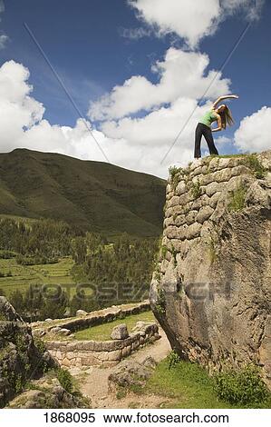 Stock Photography - woman doing yoga, cuzco (cusco), peru. Fotosearch