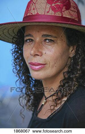 woman wearing a hat, caminito district, buenos aires, argentina View Large Photo Image Stock Photo - woman wearing a hat, caminito district, buenos aires, argentina. Fotosearch