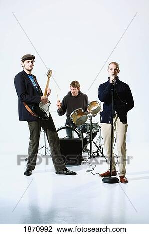 a band with a singer, drummer and electric guitar player View Large Photo Image Stock Image - a band with a singer, drummer and electric guitar player. Fotosearch