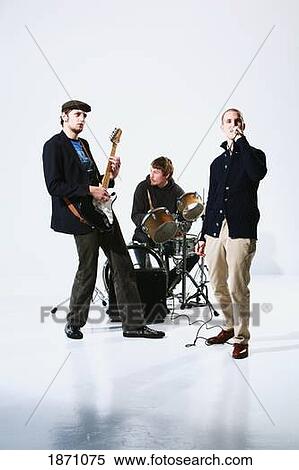 a band with a singer, drummer and electric guitar player View Large Photo Image Stock Photography - a band with a singer, drummer and electric guitar player. Fotosearch