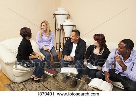 a group of adults in a home bible study View Large Photo Image Stock Image - a group of adults in a home bible study. Fotosearch