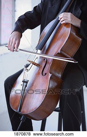 a person playing a cello View Large Photo Image Stock Photo - a person playing a cello. Fotosearch