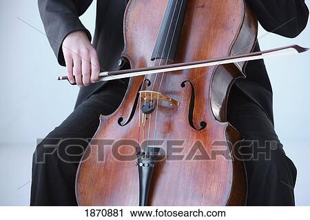 a person playing the cello View Large Photo Image Stock Image - a person playing the cello. Fotosearch