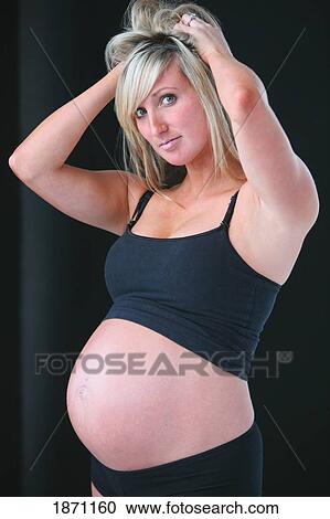 Stock Image - a pregnant woman. Fotosearch