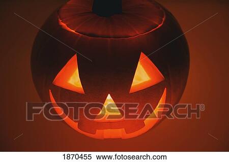 a pumpkin carved into a happy face View Large Photo Image Stock Photography - a pumpkin carved into a happy face. Fotosearch