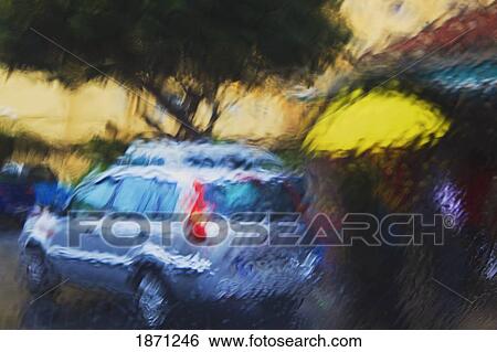 a rainy day viewed through a vehicle window View Large Photo Image Stock Photograph - a rainy day viewed through a vehicle window. Fotosearch