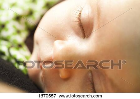 Stock Photo - a sleeping infant. Fotosearch