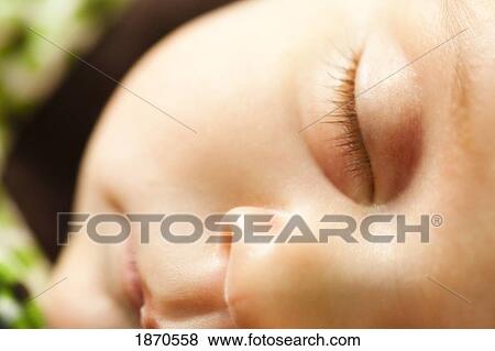a sleeping infant View Large Photo Image Stock Photo - a sleeping infant. Fotosearch