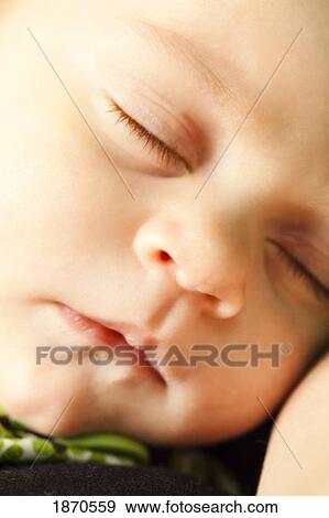 a sleeping infant View Large Photo Image Stock Photo - a sleeping infant. Fotosearch