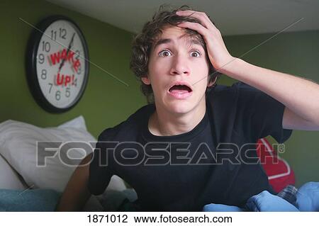 a teenage boy getting out of bed late View Large Photo Image Stock Image - a teenage boy getting out of bed late. Fotosearch