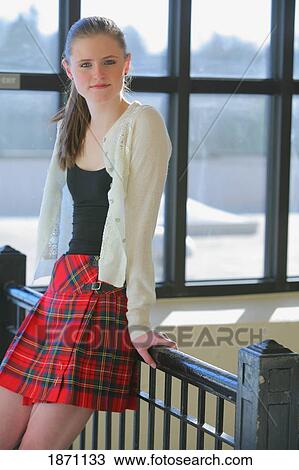 a teenage girl wearing a plaid kilt View Large Photo Image Stock Image - a teenage girl wearing a plaid kilt. Fotosearch