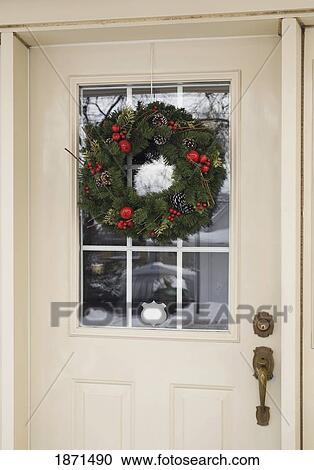 a wreath on a front door View Large Photo Image Stock Image - a wreath on a front door. Fotosearch