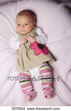 an infant girl all dressed up View Large Photo Image Picture - an infant girl all dressed up. Fotosearch