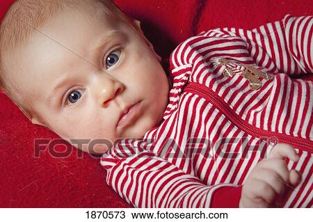 an infant wearing red and white View Large Photo Image Stock Image - an infant wearing red and white. Fotosearch