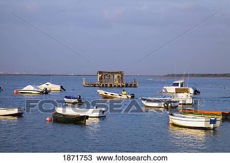 andalusia, spain; boats moored in the water near chiclana View Large Photo Image Stock Image - andalusia, spain; boats moored in the water near chiclana. Fotosearch