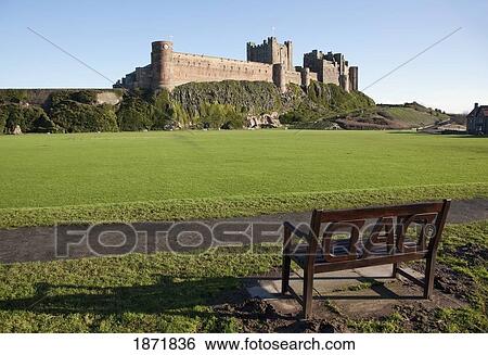 bamburgh, northumberland, england; a bench across the lawn from a castle View Large Photo Image Stock Photograph - bamburgh, northumberland, england; a bench across the lawn from a castle. Fotosearch