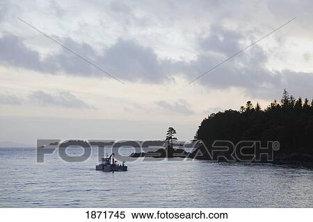 blackwater, county kerry, ireland; fishing boat on the water off the shore View Large Photo Image Stock Photography - blackwater, county kerry, ireland; fishing boat on the water off the shore. Fotosearch