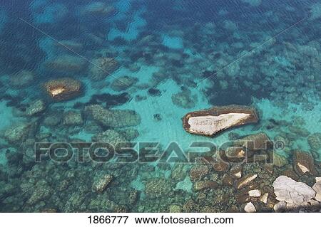 bonifacio, corsica, france; view of aqua blue water and rocks View Large Photo Image Stock Photo - bonifacio, corsica, france; view of aqua blue water and rocks. Fotosearch