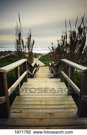 cadiz, andalusia, spain; a wooden boardwalk on arte y vida beach at tarifa, costa de la luz View Large Photo Image Stock Image - cadiz, andalusia, spain; a wooden boardwalk on arte y vida beach at tarifa, costa de la luz. Fotosearch