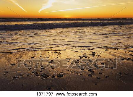 cadiz, andalusia, spain; sunset on hurricane hotel beach at tarifa, costa de la luz View Large Photo Image Stock Photo - cadiz, andalusia, spain; sunset on hurricane hotel beach at tarifa, costa de la luz. Fotosearch